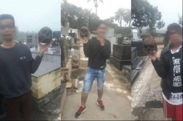 Jovens são apreendidos por tirar selfie com crânio em cemitério(Imagem:Reprodução)