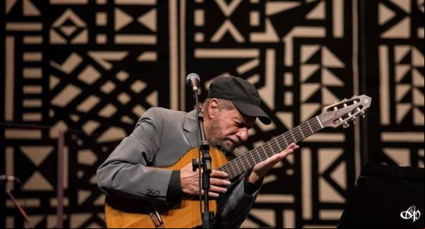 Em mais uma incursão pelo universo da música popular do Brasil, a Orquestra Ouro Preto dá toque sinfônico ao cancioneiro do compositor João Bosco. Conterrâneo da orquestra regida(Imagem:Reprodução)