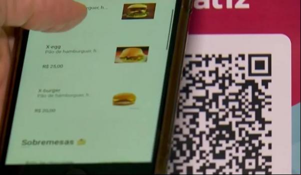Bares e restaurantes poderão utilizar cardápio digital desde que tenham, pelo menos, um físico.(Imagem:Reprodução / EPTV)