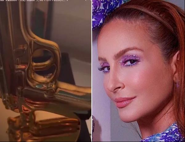 Claudia Leitte é criticada por postar abajur em formato de arma sobre bíblia.(Imagem:Reprodução/Twitter)